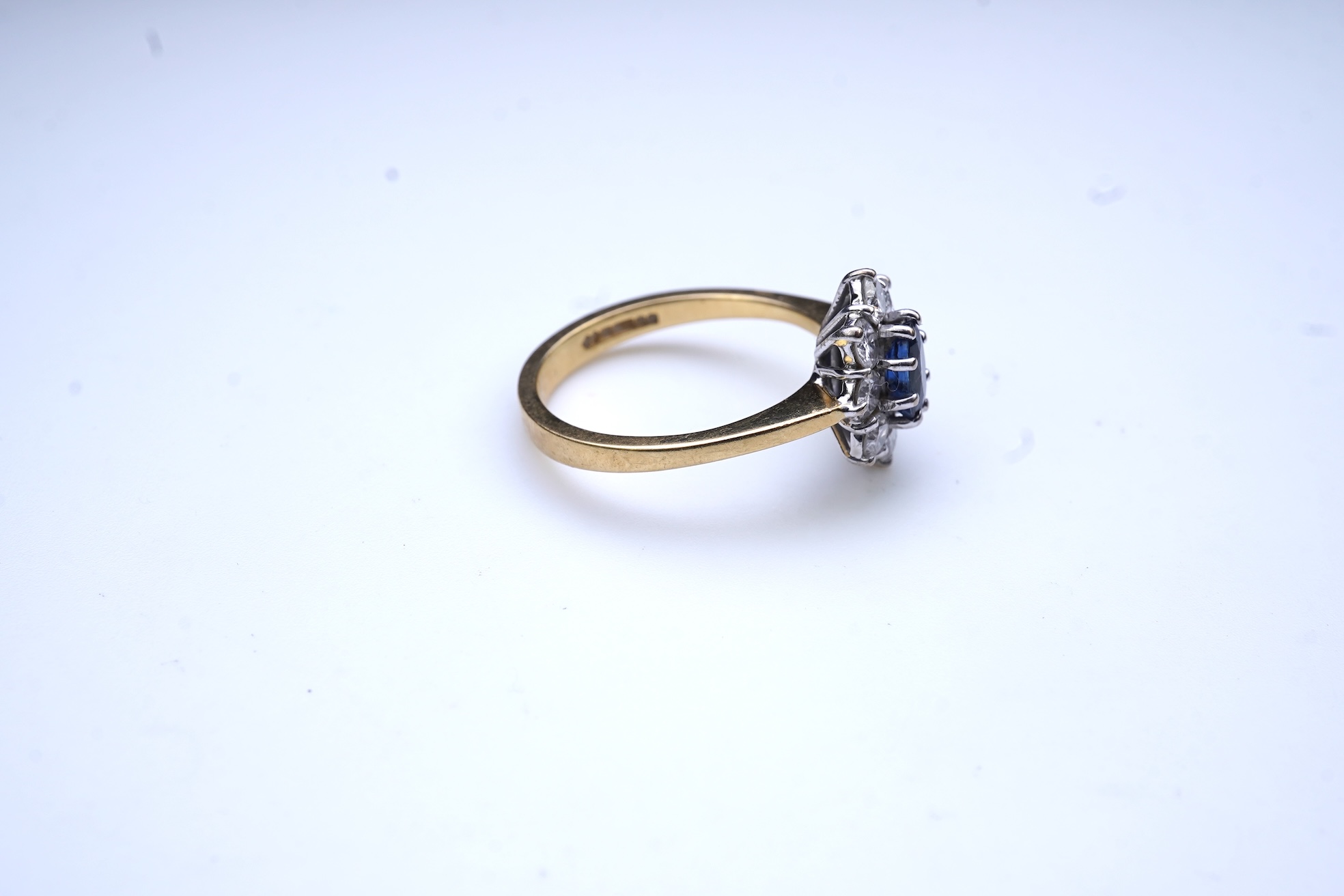 A sapphire and diamond cluster ring